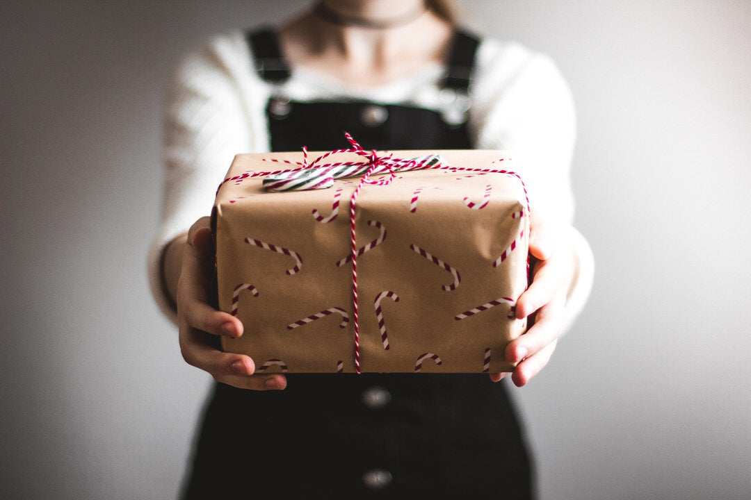 Woman holding gift box